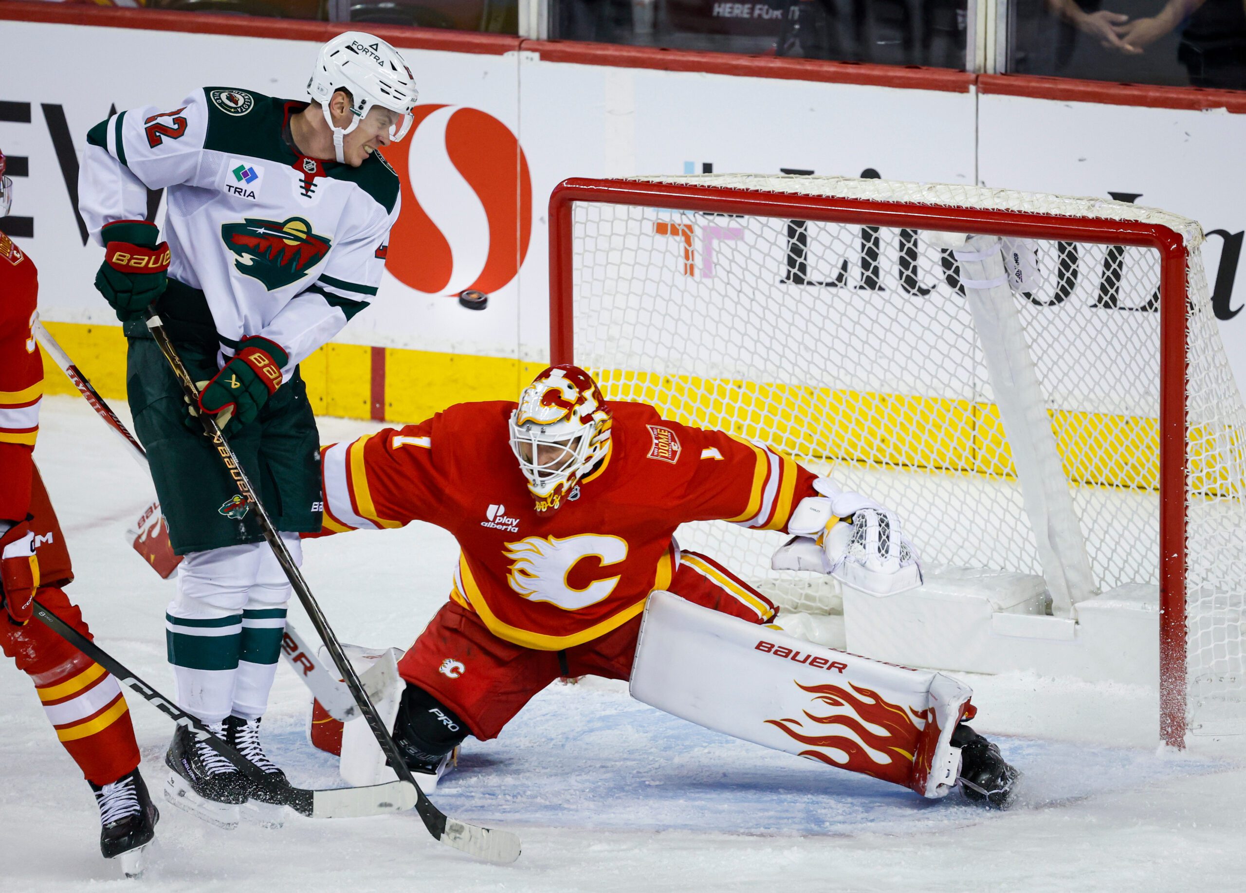 Cooley makes 36 saves in the Flames’ 2-1 victory over the Wild — KSTP 5, Maple Grove Sports news